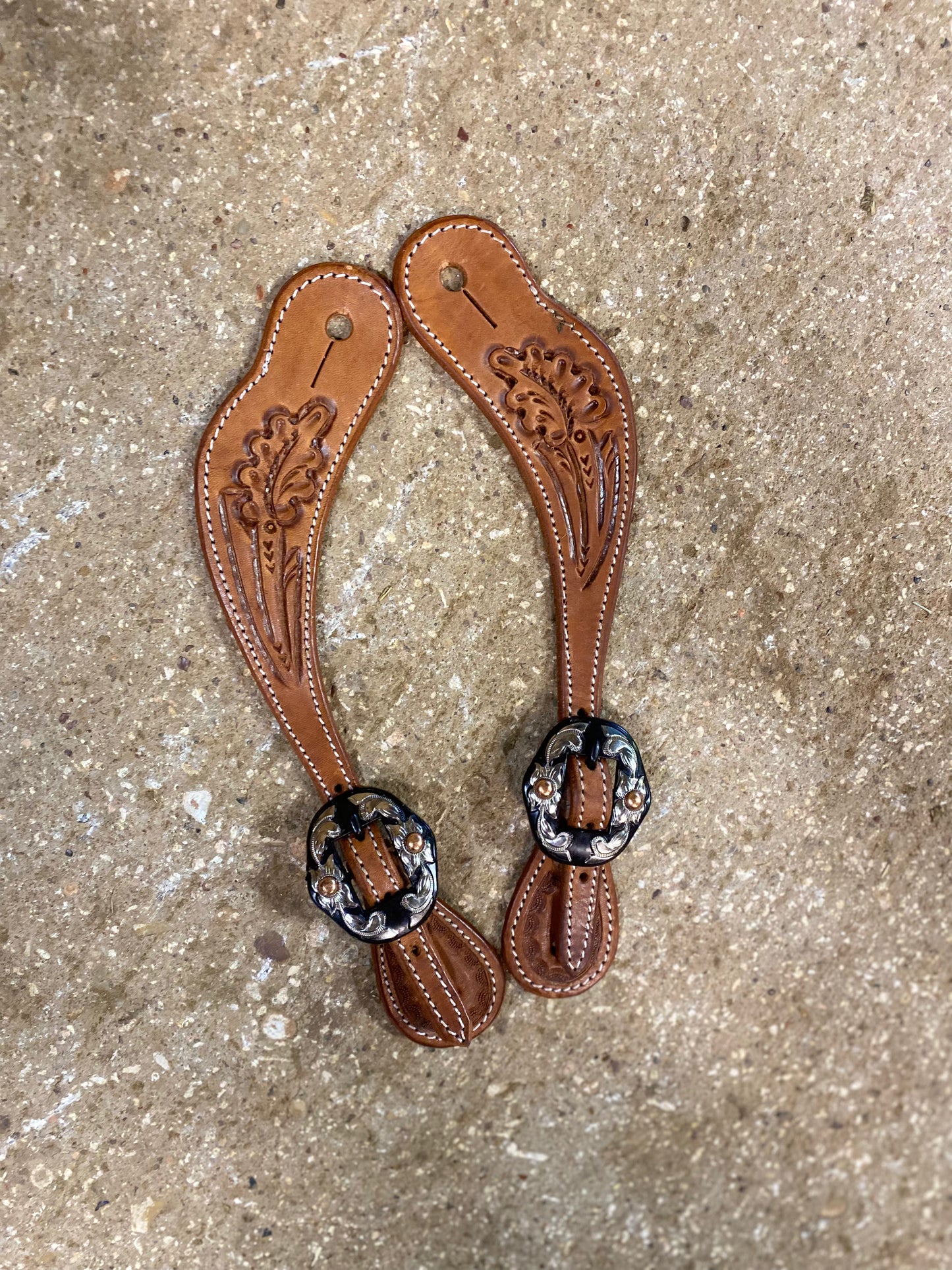 Oak leaf tooled spur straps