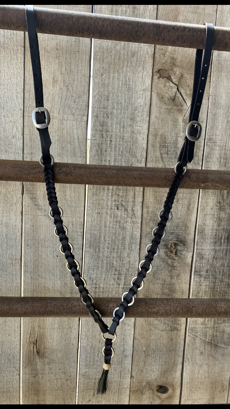 Ring and leather headstall, breast collar and rein