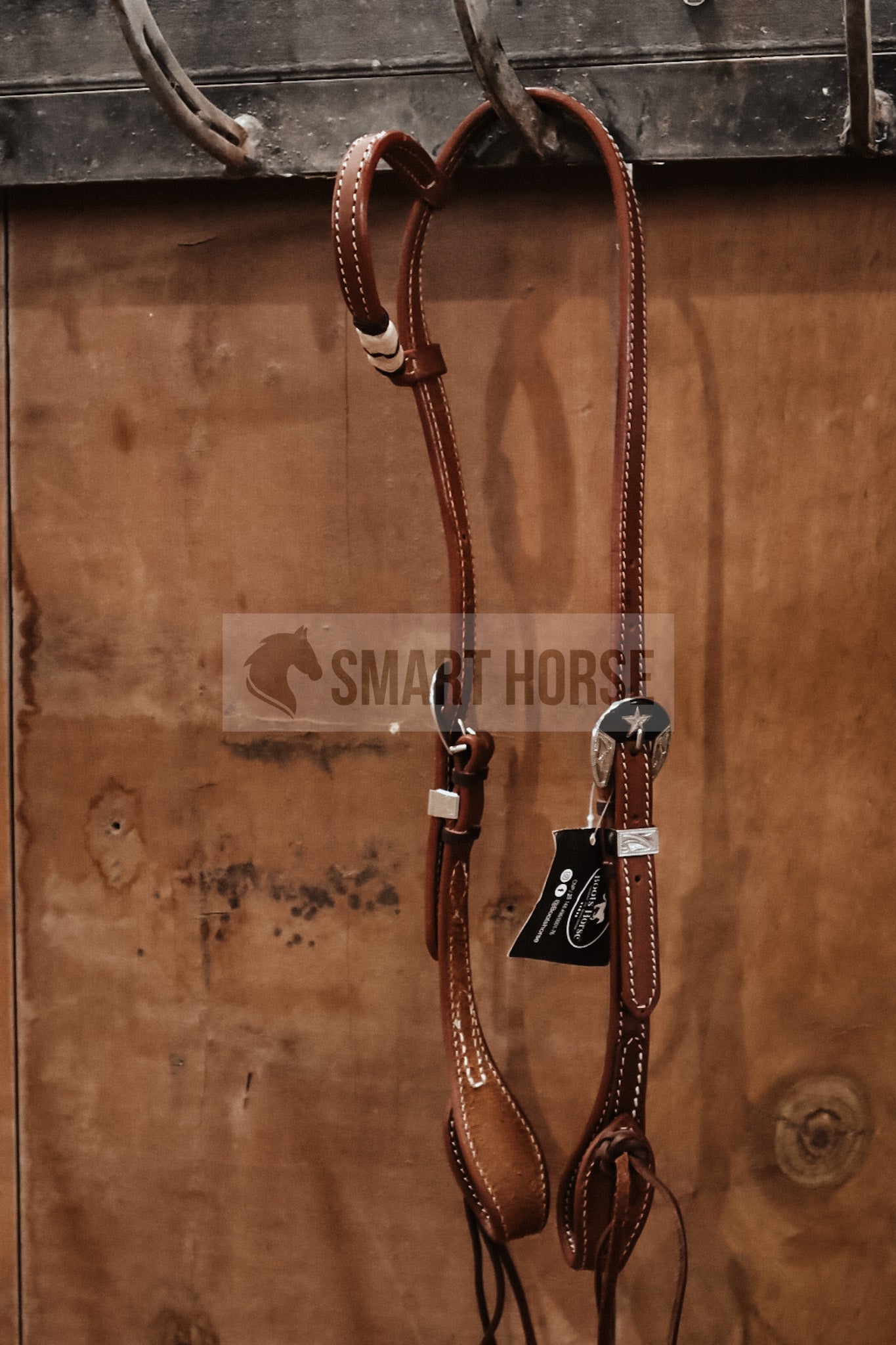 One ear headstall with rawhide accent piece