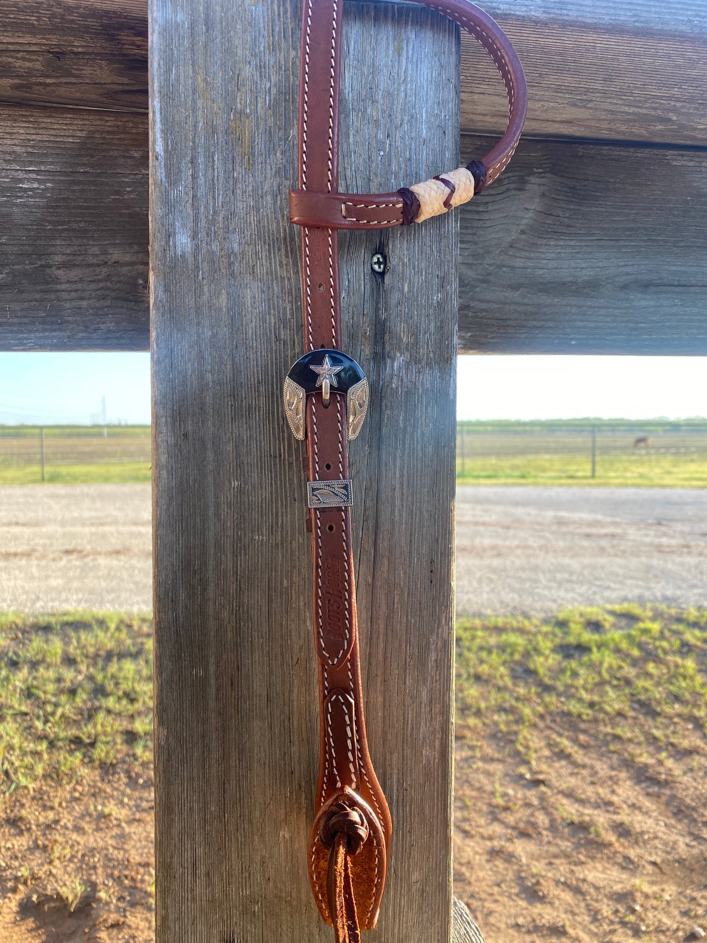 One ear headstall with rawhide accent piece